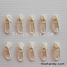 หัวซิปฟันไนลอน ป้าย ขนาดเบอร์ 5  บรรจุ 20 อัน สีครีม