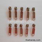 หัวซิปฟันไนลอน สี่เหลี่ยมป้ายยาว ขนาดเบอร์ 5  บรรจุ 20 อัน สีนิเกิ้ล