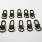 คอหมาโลหะ หลุยส์ ขนาด 1.4x3.2 cm  บรรจุ 10 อัน สีทองรมดำ