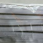 รางผ้าซิปเฉพาะรางซิป ฟันเหล็ก ขนาดเบอร์ 3 ฟันสีทองรมดำ บรรจุ 12 หลา สีขาว