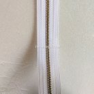 รางผ้าซิปเฉพาะรางซิป ฟันเหล็ก ขนาดเบอร์ 3 ฟันสีทองรมดำ บรรจุ 12 หลา สีขาว รูป 2