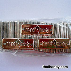 ป้ายโลหะ สี่เหลี่ยม ขนาด 1.5x4.5 cm  บรรจุ 100 อัน สีเงิน รูปเต็ม