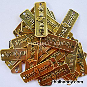 ป้ายโลหะ สี่เหลี่ยม ขนาด 1.5x4.5 cm  บรรจุ 100 อัน สีทองรมดำ รูปเต็ม