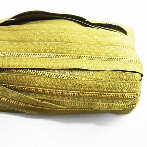 รางผ้าซิปเฉพาะรางซิป ฟันเหล็ก ขนาดเบอร์ 3 ฟันสีทองเหลือง บรรจุ 12 หลา สีกากีอ่อน รูปเต็ม