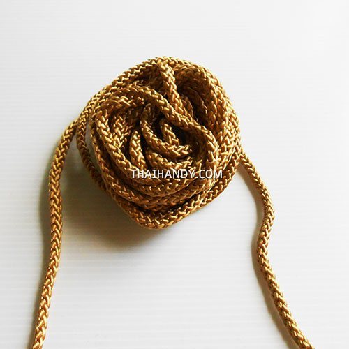 เชือกถักเปีย  PP  ขนาด 5 mm  บรรจุ 500 กรัม สีกากีแกมทอง รูปเต็ม