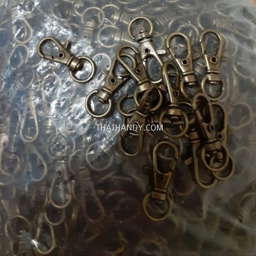 คอหมาโลหะ ดีด ขนาด 1x3.3 cm  บรรจุยกถุงไม่นับใหม่ได้ 970-1000 อัน สีทองรมดำ รูปเต็ม