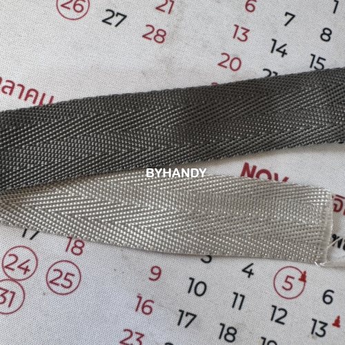 สายผ้า-ผ้ากุ๊น PP  ลายก้างปลา ขนาด 1 นิ้ว บรรจุ 50 เมตร สีเทาเข้ม รูปเต็ม